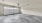 a room with a white wall and a white door