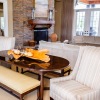 a clubhouse room with chairs and tables