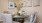 a dining room table with plates and cups on it